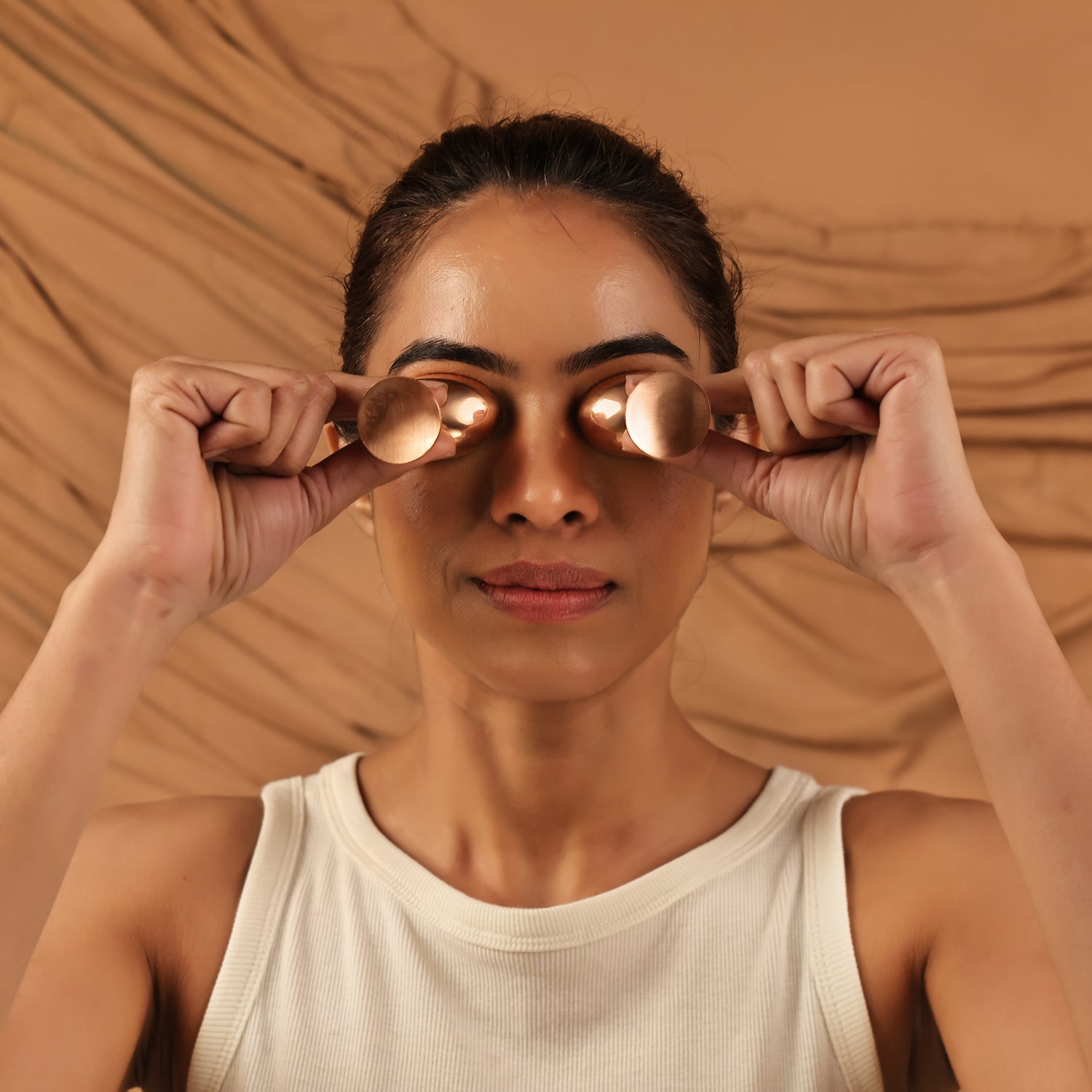 Ayurveda Eye Care by Art of Vedas - Woman Using Copper Kansa Eye Cups for Ayurvedic Eye Rejuvenation and Natural Vision Wellness Therapy